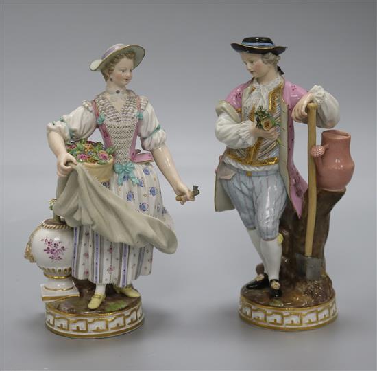 A pair of Meissen porcelain figures of gardeners, late 19th century, height 19cm, slight losses